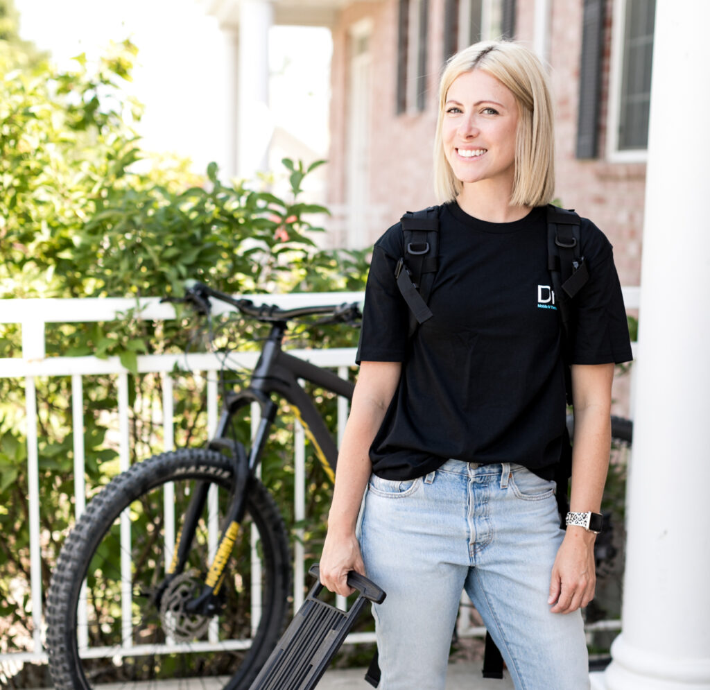 Smiling Nurse on Porch explaining reasons to try iv therapy in utah and idaho